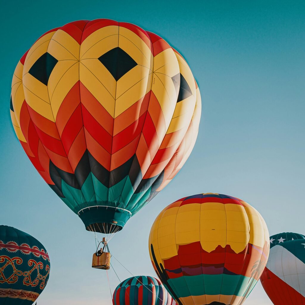 Vibrant hot air balloons soaring in the sky, offering a stunning view.